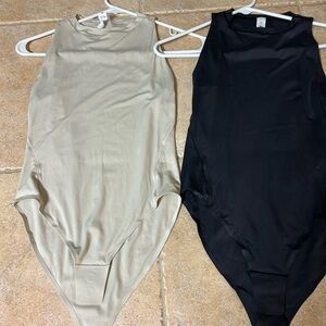 Lululemon wundermost Beige and Black Sleeveless Bodysuits Sz sm